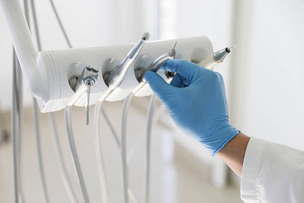 Professional Tooth Extraction technician working in Lincolnshire, IL